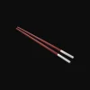 Christofle Set of two red Chinese chopsticks and chopsticks rests