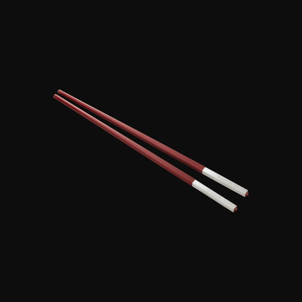 Christofle Set of two red Chinese chopsticks and chopsticks rests